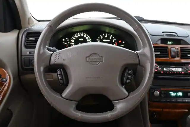 Beige Sedan, Nissan Maxima – ZEG-990
