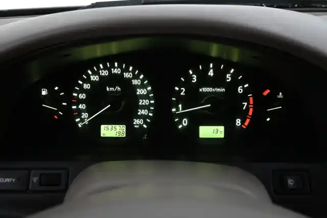 Beige Sedan, Nissan Maxima – ZEG-990