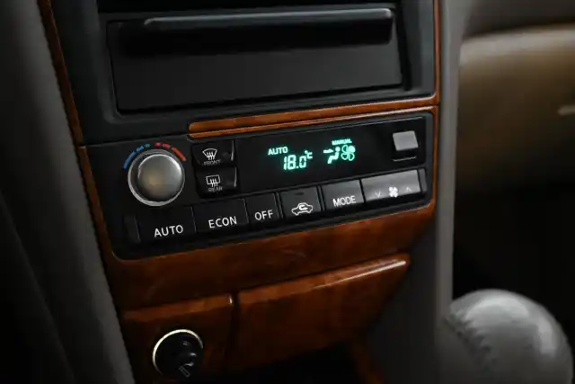 Beige Sedan, Nissan Maxima – ZEG-990
