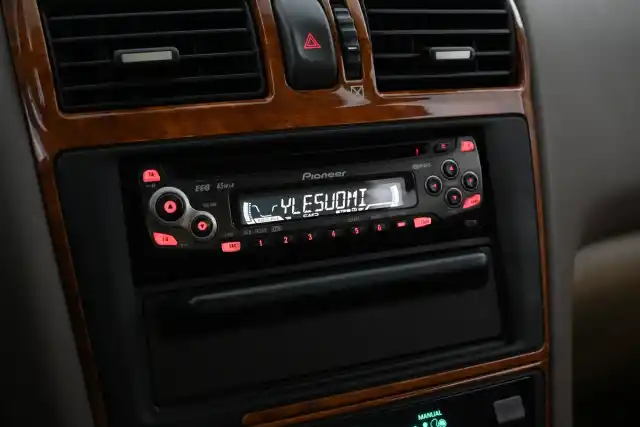 Beige Sedan, Nissan Maxima – ZEG-990